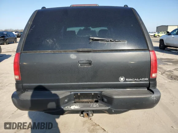 ✅ 1999 Cadillac Escalade • VIN: 1GYEK13R7XR402243 • Lot: 43269935. Wystawiony na Copart z przebiegiem 231 465 mil. Bezpłatny archiwum sprzedaży aukcyjnych z USA i szczegółowy raport historii pojazdu na DreamBid. Zdjęcie 6.