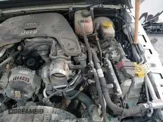 ✅ 2021 Jeep Wrangler Unlimited Rubicon • VIN: 1C4HJXFG6MW534099 • Лот: 66996175. Опубликован ранее на Copart с пробегом 61 734 миль. Бесплатный доступ к архиву аукционных продаж из США и подробный отчёт об истории автомобиля на DreamBid. Изображение 14.