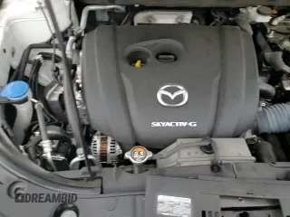 ✅ 2020 Mazda CX-5 Grand Touring • VIN: JM3KFADM6L0853444 • Lot: 82767985. Wystawiony na Copart z przebiegiem 26 168 mil. Bezpłatny archiwum sprzedaży aukcyjnych z USA i szczegółowy raport historii pojazdu na DreamBid. Zdjęcie 16.