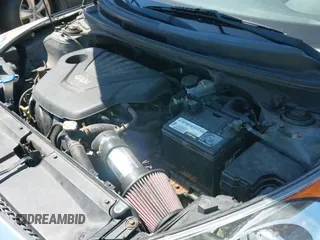 2012 Hyundai Veloster w/Black Int with VIN KMHTC6AD5CU030788, listed as a IAAI auction lot 42774337 with 104,297 mi miles and . Bid and sale history available at DreamBid. Image 12.