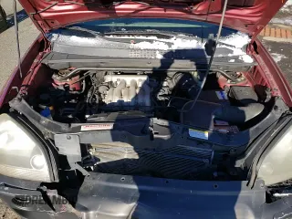 2006 Hyundai Tucson GLS z VIN KM8JN12D66U431452, wystawiony jako Copart lot #83564274 z przebiegiem 229 855 mil mil oraz Szkoda całkowita • Salvage title. Historia ofert i sprzedaży dostępna na DreamBid. Obrazek 16.