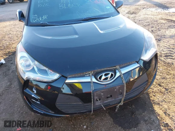 ✅ 2013 Hyundai Veloster w/Gray Int • VIN: KMHTC6AD8DU175342 • Lot: 41423246. Wystawiony na IAAI z przebiegiem Nie podano. Bezpłatny archiwum sprzedaży aukcyjnych z USA i szczegółowy raport historii pojazdu na DreamBid. Zdjęcie 6.