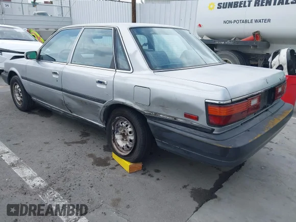 ✅ 1990 Toyota Camry • VIN: 4T1SV24E0LU190211 • Lot: 42368986. Wystawiony na IAAI z przebiegiem 145 167 mil. Bezpłatny archiwum sprzedaży aukcyjnych z USA i szczegółowy raport historii pojazdu na DreamBid. Zdjęcie 3.