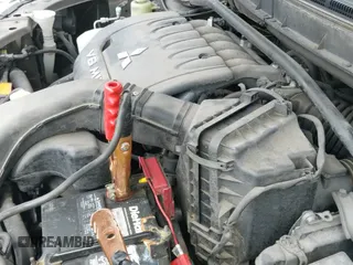 ✅ 2010 Mitsubishi Outlander XLS • VIN: JA4JT4AX6AZ003099 • Lot: 42458993. Listed on IAAI with 218,614 mi. Free auction sales archive from the USA and detailed vehicle history report at DreamBid. Image 12.