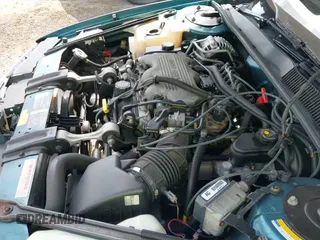 ✅ 1994 Pontiac Grand Prix • VIN: 1G2WJ52M9RF282321 • Lot: 42753061. Wystawiony na IAAI z przebiegiem 104 132 mil. Bezpłatny archiwum sprzedaży aukcyjnych z USA i szczegółowy raport historii pojazdu na DreamBid. Zdjęcie 23.