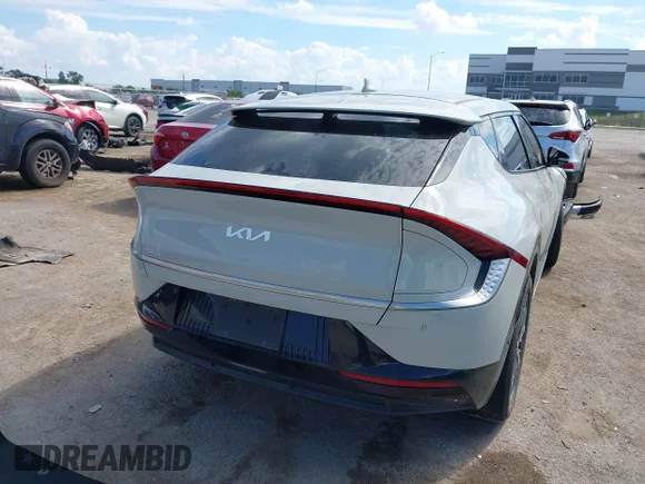 ✅ 2022 Kia EV6 Wind • VIN: KNDC3DLC9N5029010 • Лот: 43387140. Опубліковано раніше на IAAI з пробігом 22 912 миль. Безкоштовний доступ до архіву аукціонних продажів зі США та докладний звіт про історію автомобіля на DreamBid. Зображення 4.