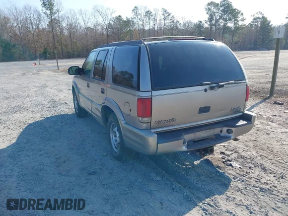 ✅ 2000 Oldsmobile Bravada • VIN: 1GHDT13W3Y2231550 • Lot: 41518286. Listed on IAAI with 313,805 mi. Free auction sales archive from the USA and detailed vehicle history report at DreamBid. Image 3.