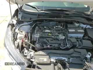 ✅ 2023 Toyota Corolla Cross LE • VIN: 7MUCAAAG4PV070612 • Lot: 58989675. Listed on Copart with 11,807 mi. Free auction sales archive from the USA and detailed vehicle history report at DreamBid. Image 16.