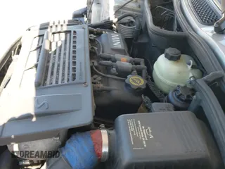 ✅ 2003 MINI Hardtop S • VIN: WMWRE33443TD70055 • Lot: 42132875. Listed on IAAI with 154,901 mi. Free auction sales archive from the USA and detailed vehicle history report at DreamBid. Image 17.