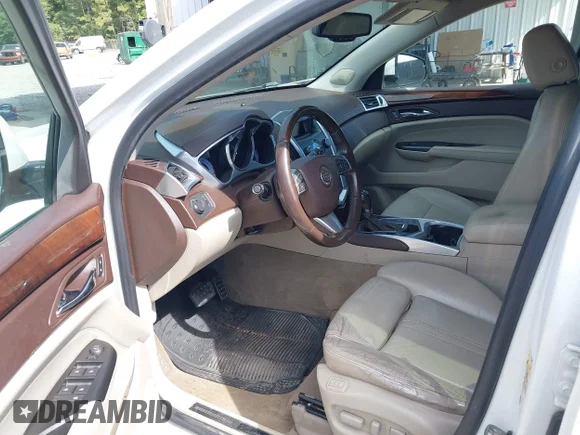 ✅ 2012 Cadillac SRX Luxury Collection • VIN: 3GYFNAE31CS604958 • Лот: 43346980. Опубліковано раніше на IAAI з пробігом 174 630 миль. Безкоштовний доступ до архіву аукціонних продажів зі США та докладний звіт про історію автомобіля на DreamBid. Зображення 5.