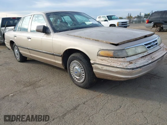 ✅ 1997 Ford Crown Victoria Police • VIN: 2FALP71W4VX207848 • Lot: 43603542. Listed on IAAI with 205,145 mi. Free auction sales archive from the USA and detailed vehicle history report at DreamBid. Image 1.