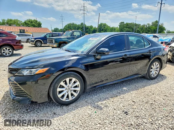 ✅ 2018 Toyota Camry LE • VIN: 4T1B11HKXJU545985 • Lot: 59603896. Listed on Copart with 134,396 mi. Free auction sales archive from the USA and detailed vehicle history report at DreamBid. Image 1.