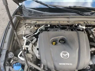 ✅ 2021 Mazda CX-30 Premium • VIN: 3MVDMBDM0MM218214 • Lot: 92629905. Listed on Copart with 75,604 mi. Free auction sales archive from the USA and detailed vehicle history report at DreamBid. Image 17.