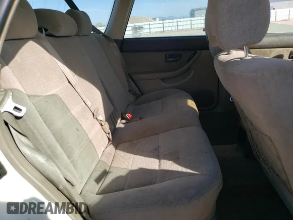 ✅ 2003 Subaru Legacy Outback • VIN: 4S3BH665636642960 • Лот: 74935984. Опубліковано раніше на Copart з пробігом 156 144 миль. Безкоштовний доступ до архіву аукціонних продажів зі США та докладний звіт про історію автомобіля на DreamBid. Зображення 10.