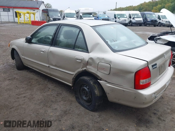 ✅ 2000 Mazda Protege DX • VIN: JM1BJ2221Y0289272 • Lot: 43420931. Wystawiony na IAAI z przebiegiem 148 468 mil. Bezpłatny archiwum sprzedaży aukcyjnych z USA i szczegółowy raport historii pojazdu na DreamBid. Zdjęcie 3.