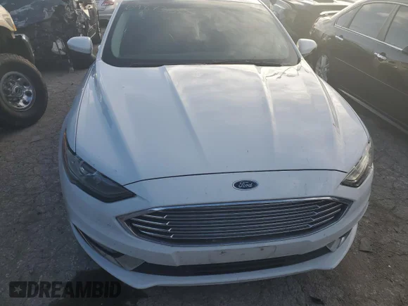✅ 2018 Ford Fusion SE • VIN: 3FA6P0LU9JR132542 • Лот: 69873582. Опубликован ранее на Copart с пробегом 128 931 миль. Бесплатный доступ к архиву аукционных продаж из США и подробный отчёт об истории автомобиля на DreamBid. Изображение 5.