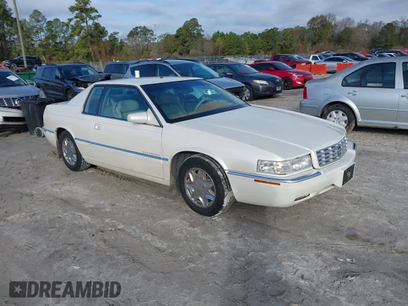 ✅ 2001 Cadillac Eldorado ESC • VIN: 1G6EL12Y41B107387 • Lot: 43846598. Listed on IAAI with 96,384 mi. Free auction sales archive from the USA and detailed vehicle history report at DreamBid. Image 1.