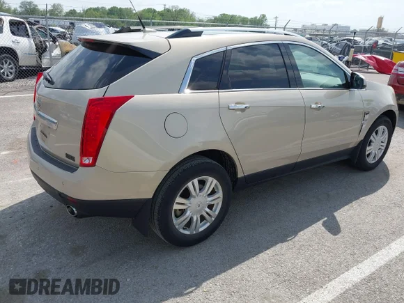 ✅ 2011 Cadillac SRX Luxury Collection • VIN: 3GYFNAEY9BS520381 • Lot: 42141457. Wystawiony na IAAI z przebiegiem 54 020 mil. Bezpłatny archiwum sprzedaży aukcyjnych z USA i szczegółowy raport historii pojazdu na DreamBid. Zdjęcie 4.