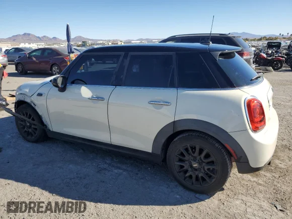 ✅ 2015 MINI Hardtop 4 Door • VIN: WMWXS5C55FT831317 • Lot: 79023244. Wystawiony na Copart z przebiegiem 69 508 mil. Bezpłatny archiwum sprzedaży aukcyjnych z USA i szczegółowy raport historii pojazdu na DreamBid. Zdjęcie 2.