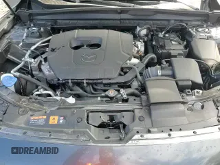 ✅ 2025 Mazda CX-50 S Preferred • VIN: 7MMVABBM4SN328333 • Лот: 84907405. Опубликован ранее на Copart с пробегом 9 953 миль. Бесплатный доступ к архиву аукционных продаж из США и подробный отчёт об истории автомобиля на DreamBid. Изображение 14.