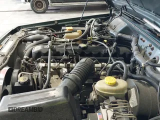 ✅ 2001 Jeep Cherokee Sport • VIN: 1J4FF58S51L579766 • Lot: 42623211. Listed on IAAI with 257,681 mi. Free auction sales archive from the USA and detailed vehicle history report at DreamBid. Image 12.