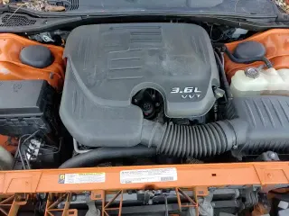 ✅ 2012 Dodge Challenger SXT • VIN: 2C3CDYAG2CH128109 • Lot: 86523804. Wystawiony na Copart z przebiegiem 126 814 mil. Bezpłatny archiwum sprzedaży aukcyjnych z USA i szczegółowy raport historii pojazdu na DreamBid. Zdjęcie 16.