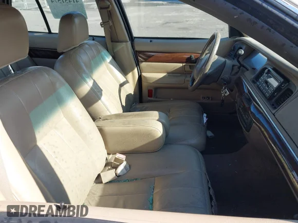 ✅ 2003 Mercury Grand Marquis LS Premium • VIN: 2MEFM75W93X631256 • Лот: 41451574. Опубликован ранее на IAAI с пробегом 90 710 миль. Бесплатный доступ к архиву аукционных продаж из США и подробный отчёт об истории автомобиля на DreamBid. Изображение 5.