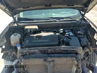 ✅ 2019 Lincoln Nautilus Reserve • VIN: 2LMPJ6L95KBL37497 • Lot: 82266015. Listed on Copart with 94,446 mi. Free auction sales archive from the USA and detailed vehicle history report at DreamBid. Image 16.