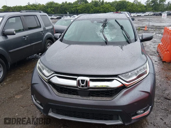 ✅ 2018 Honda CR-V Touring • VIN: 7FARW1H93JE012519 • Lot: 45186666. Wystawiony na IAAI z przebiegiem 140 049 mil. Bezpłatny archiwum sprzedaży aukcyjnych z USA i szczegółowy raport historii pojazdu na DreamBid. Zdjęcie 6.