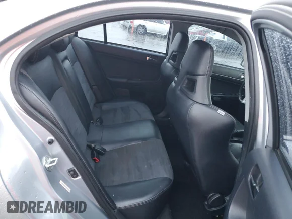 ✅ 2008 Mitsubishi Lancer Evolution MR • VIN: JA3AW56V88U051784 • Lot: 84726754. Listed on Copart with 173,556 mi. Free auction sales archive from the USA and detailed vehicle history report at DreamBid. Image 10.