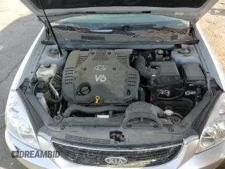 ✅ 2007 Kia Optima LX • VIN: KNAGE124875107779 • Лот: 86432344. Опубликован ранее на Copart с пробегом 185 470 миль. Бесплатный доступ к архиву аукционных продаж из США и подробный отчёт об истории автомобиля на DreamBid. Изображение 13.