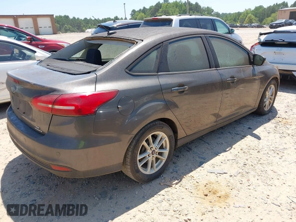 ✅ 2015 Ford Focus SE • VIN: 1FADP3F2XFL228561 • Lot: 42796493. Wystawiony na IAAI z przebiegiem 181 608 mil. Bezpłatny archiwum sprzedaży aukcyjnych z USA i szczegółowy raport historii pojazdu na DreamBid. Zdjęcie 4.