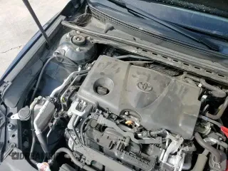 2019 Toyota Camry LE z VIN 4T1B11HK8KU822036, wystawiony jako Copart lot #71805945 z przebiegiem 106 584 mil mil oraz Szkoda całkowita • Salvage title. Historia ofert i sprzedaży dostępna na DreamBid. Obrazek 15.