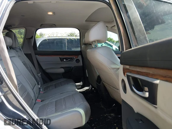 ✅ 2020 Honda CR-V Touring • VIN: 2HKRW2H97LH688719 • Lot: 45383949. Listed on IAAI with 79,667 mi. Free auction sales archive from the USA and detailed vehicle history report at DreamBid. Image 8.