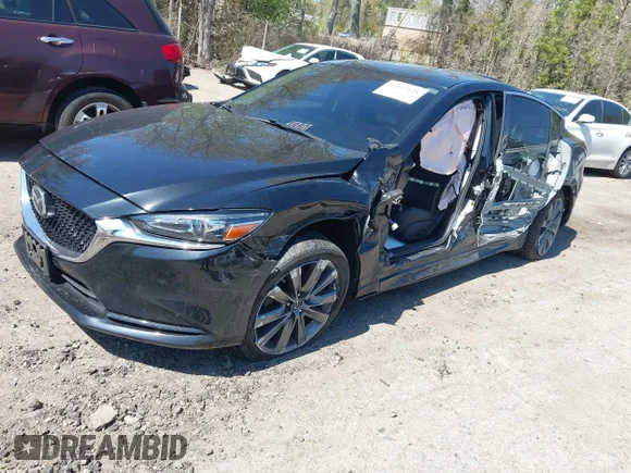 ✅ 2019 Mazda 6 Grand Touring • VIN: JM1GL1TY4K1509888 • Lot: 45027121. Wystawiony na IAAI z przebiegiem 63 077 mil. Bezpłatny archiwum sprzedaży aukcyjnych z USA i szczegółowy raport historii pojazdu na DreamBid. Zdjęcie 2.