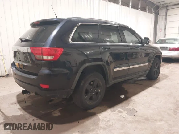 ✅ 2011 Jeep Grand Cherokee Laredo • VIN: 1J4RR4GG9BC519308 • Lot: 45122763. Listed on IAAI with 203,060 mi. Free auction sales archive from the USA and detailed vehicle history report at DreamBid. Image 4.