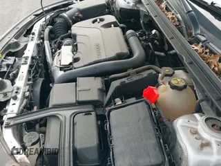 2018 Chevrolet Malibu LS z VIN 1G1ZC5ST0JF263860, wystawiony jako IAAI lot #43152367 z przebiegiem 106 196 mil mil oraz . Historia ofert i sprzedaży dostępna na DreamBid. Obrazek 19.