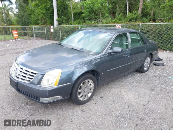 ✅ 2009 Cadillac DTS 1SC • VIN: 1G6KD57Y09U127751 • Лот: 42463390. Опубліковано раніше на IAAI з пробігом 125 065 миль. Безкоштовний доступ до архіву аукціонних продажів зі США та докладний звіт про історію автомобіля на DreamBid. Зображення 2.