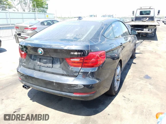 ✅ 2014 BMW 3 Series 328i Gran Turismo xDrive • VIN: WBA3X5C58ED557328 • Лот: 40569980. Опубліковано раніше на Copart з пробігом 60 910 миль. Безкоштовний доступ до архіву аукціонних продажів зі США та докладний звіт про історію автомобіля на DreamBid. Зображення 4.