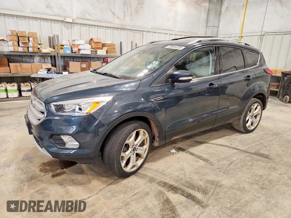 ✅ 2019 Ford Escape Titanium • VIN: 1FMCU9J99KUA73488 • Лот: 55865326. Опубликован ранее на Copart с пробегом 158 117 миль. Бесплатный доступ к архиву аукционных продаж из США и подробный отчёт об истории автомобиля на DreamBid. Изображение 1.