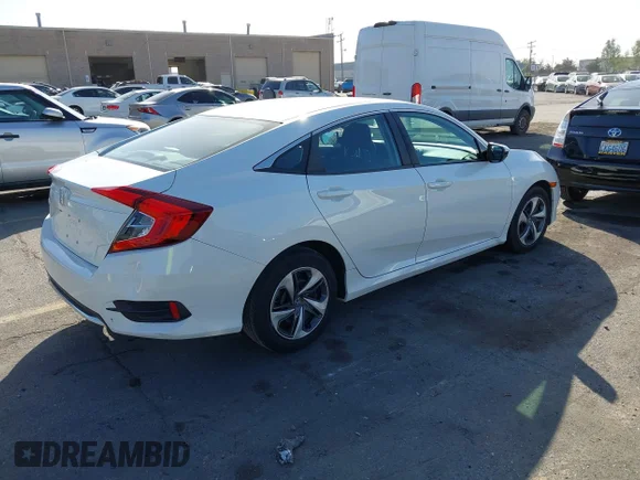 ✅ 2019 Honda Civic LX • VIN: 19XFC2F6XKE214447 • Lot: 45302769. Wystawiony na IAAI z przebiegiem 35 866 mil. Bezpłatny archiwum sprzedaży aukcyjnych z USA i szczegółowy raport historii pojazdu na DreamBid. Zdjęcie 4.