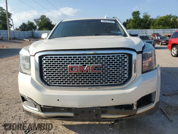 ✅ 2015 GMC Yukon Denali • VIN: 1GKS1CKJ0FR530006 • Лот: 66010184. Опубликован ранее на Copart с пробегом 140 292 миль. Бесплатный доступ к архиву аукционных продаж из США и подробный отчёт об истории автомобиля на DreamBid. Изображение 5.
