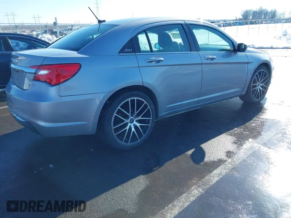 ✅ 2013 Chrysler 200 Touring • VIN: 1C3CCBBGXDN658965 • Lot: 44225634. Listed on IAAI with 209,776 mi. Free auction sales archive from the USA and detailed vehicle history report at DreamBid. Image 4.
