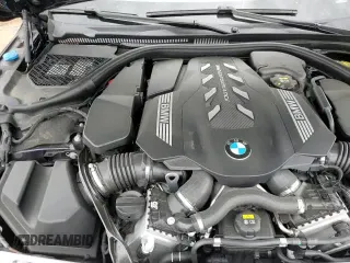 ✅ 2022 BMW 8 Series M850i • VIN: WBAGV8C04NCH65678 • Lot: 70769545. Listed on Copart with 34,536 mi. Free auction sales archive from the USA and detailed vehicle history report at DreamBid. Image 13.