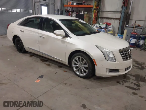 ✅ 2014 Cadillac XTS Premium • VIN: 2G61P5S38E9215405 • Lot: 43910405. Wystawiony na IAAI z przebiegiem 29 630 mil. Bezpłatny archiwum sprzedaży aukcyjnych z USA i szczegółowy raport historii pojazdu na DreamBid. Zdjęcie 1.
