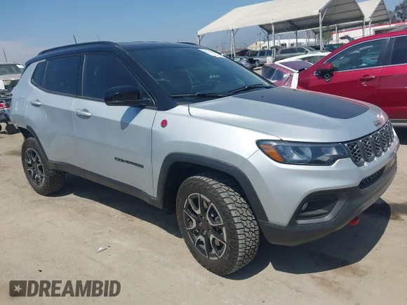 ✅ 2025 Jeep Compass Trailhawk • VIN: 3C4NJDDN0ST542351 • Lot: 45256482. Listed on IAAI with 17,044 mi. Free auction sales archive from the USA and detailed vehicle history report at DreamBid. Image 1.