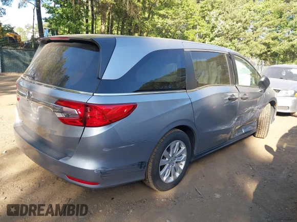 ✅ 2020 Honda Odyssey LX • VIN: 5FNRL6H21LB000294 • Lot: 45315708. Listed on IAAI with 104,589 mi. Free auction sales archive from the USA and detailed vehicle history report at DreamBid. Image 4.