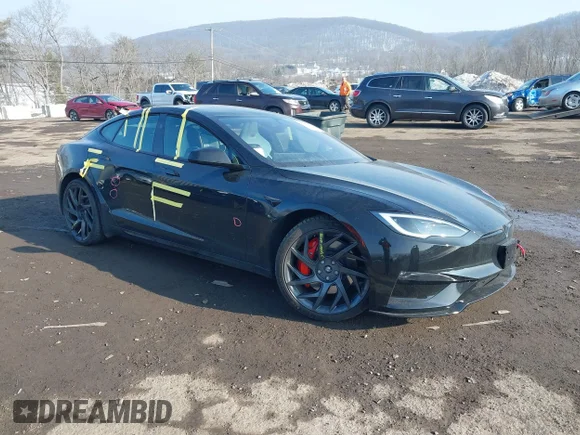 ✅ 2026 Tesla Model S Plaid • VIN: 5YJSA1E63TF556107 • Lot: 44412334. Wystawiony na IAAI z przebiegiem 1 035 mil. Bezpłatny archiwum sprzedaży aukcyjnych z USA i szczegółowy raport historii pojazdu na DreamBid. Zdjęcie 1.