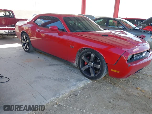 ✅ 2012 Dodge Challenger SRT-8 392 • VIN: 2C3CDYCJ5CH228052 • Lot: 44011828. Wystawiony na IAAI z przebiegiem 86 049 mil. Bezpłatny archiwum sprzedaży aukcyjnych z USA i szczegółowy raport historii pojazdu na DreamBid. Zdjęcie 1.