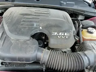 2018 Dodge Challenger SXT Plus z VIN 2C3CDZAG4JH118734, wystawiony jako Copart lot #63112725 z przebiegiem 113 871 mil mil oraz Szkoda całkowita • Salvage title. Historia ofert i sprzedaży dostępna na DreamBid. Obrazek 13.